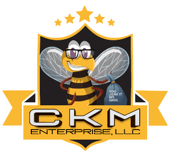 Logo of CKM Enterprise, LLC featuring a cartoon bee wearing glasses and holding a garbage bag, with the tagline 'YOU JUNK IT, WE HAUL' and five stars above.